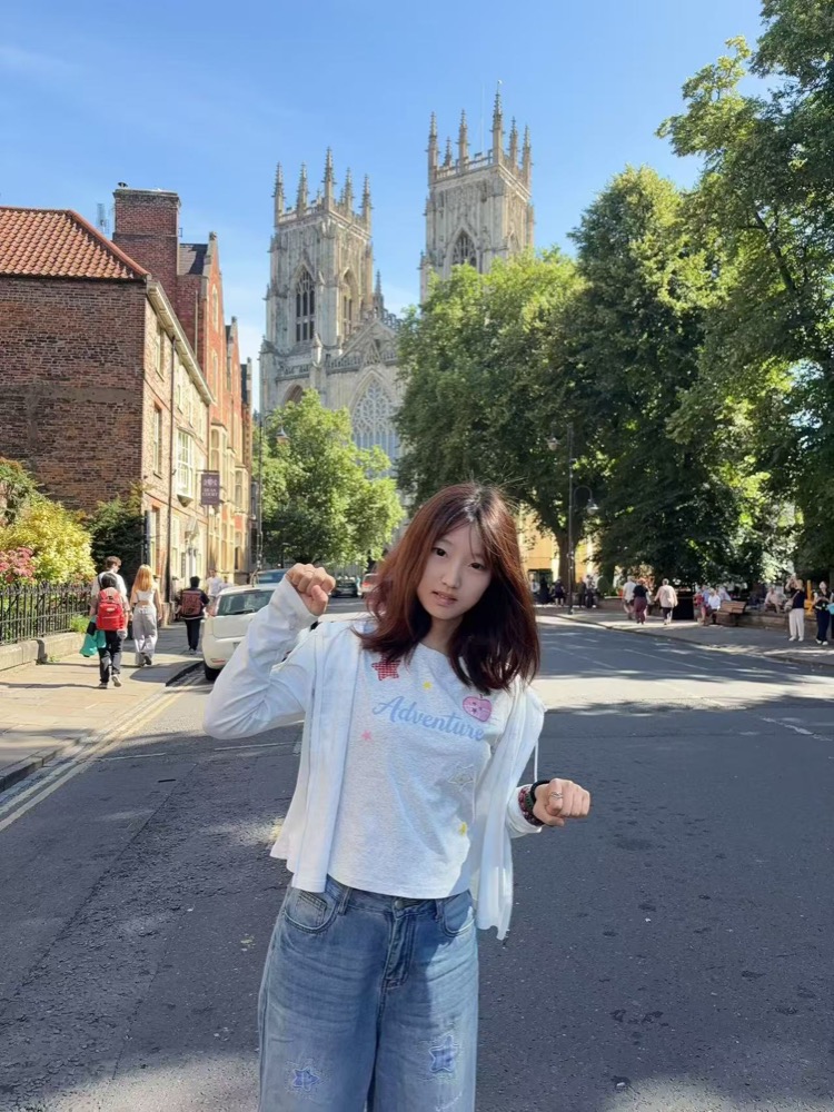 Min Li in front of York Minster